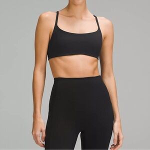 Lululemon Wunder Train Strappy Racer Bra
Light Support, A/B Cup • Size 2